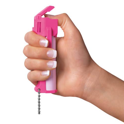 Mace Hard Case Pepper Spray Pink Key Chain in hand Mace Hard Case Pepper Spray Pink Key Chain in Hand